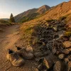 Randonnée en montagne l'été : les critères qui changent tout entre sentier sec et pierrier humide