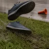 HIIT en extérieur : pourquoi vos chaussures de salle ne tiennent pas sur l'herbe mouillée